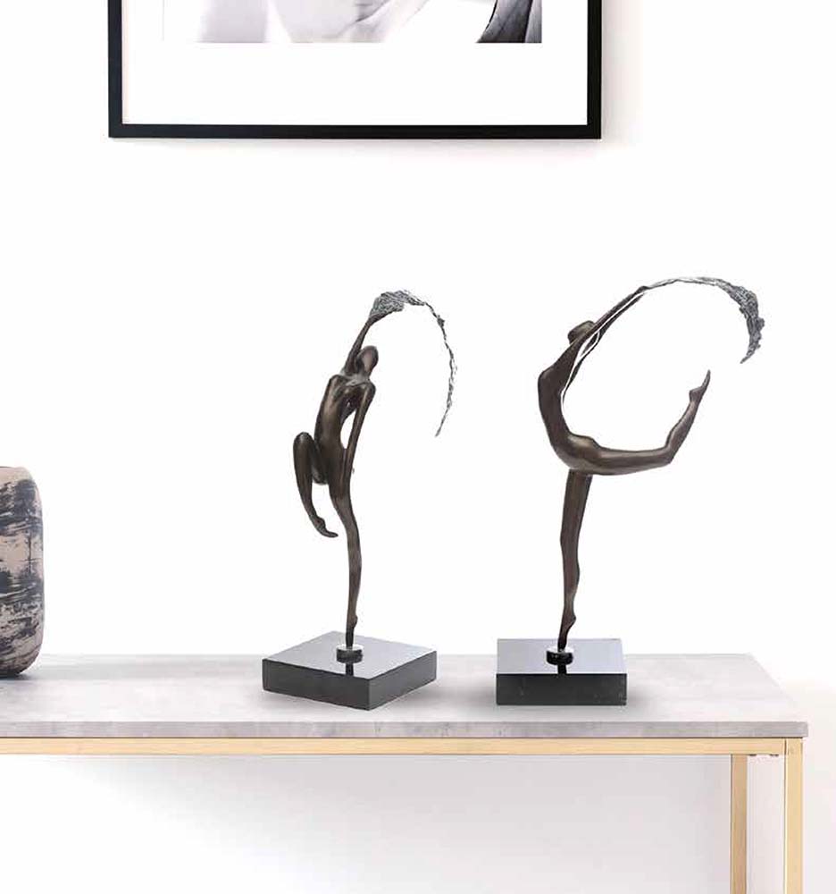 Art by Style - A Dancing sculpture in bronze made from solid bronze and polished to a smooth finish with textured detail
