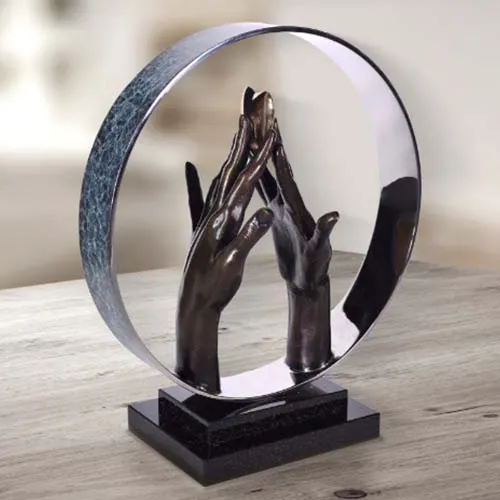 stunning sculpture pair of hand with fingertips touching inside circle